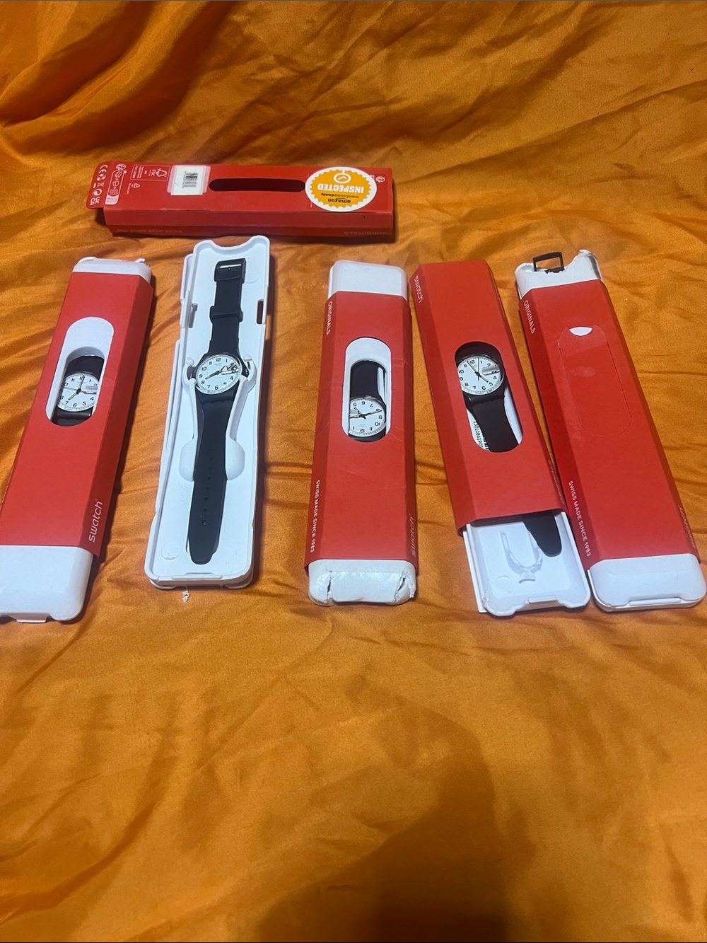 Swatch Black Strap Watches with Red Packaging (Black, Red, White) “Read Details”